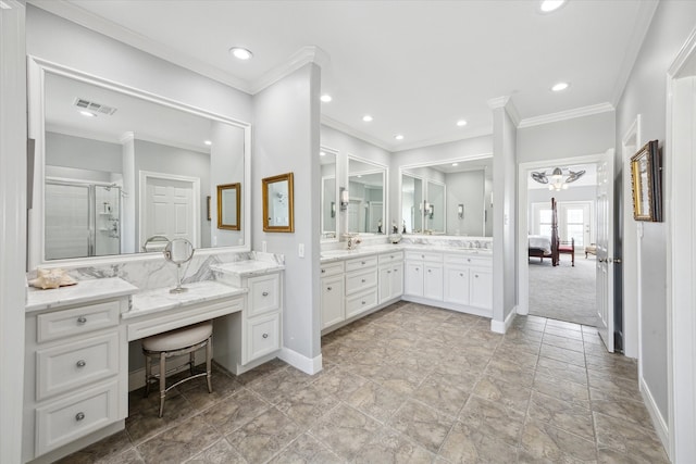 full bath featuring visible vents, crown molding, a shower stall, and vanity