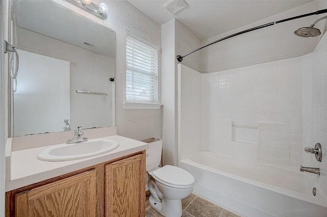 full bathroom with vanity, bathing tub / shower combination, tile patterned floors, and toilet