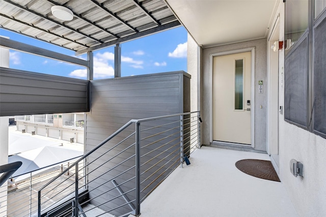 doorway to property with a balcony