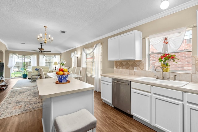 kitchen featuring white cabinetry, dishwasher, sink, and dark hardwood / wood-style flooring