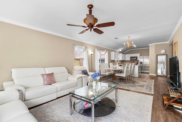 living room featuring crown molding, vaulted ceiling, a textured ceiling, dark hardwood / wood-style flooring, and ceiling fan with notable chandelier