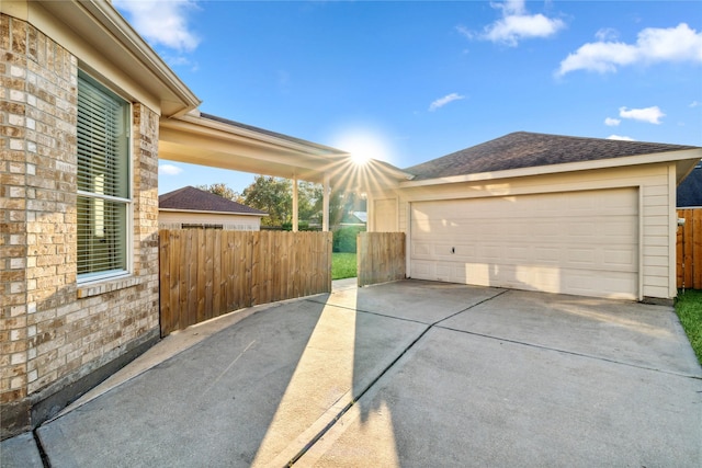 detached garage with fence