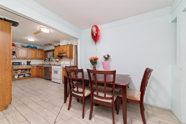 dining space with sink