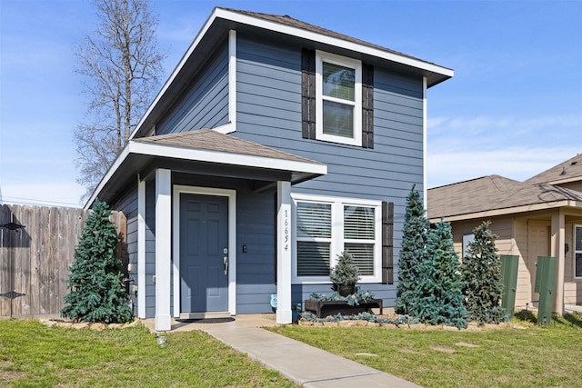 view of front of property with a front lawn