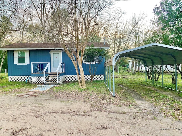 view of front facade featuring a carport