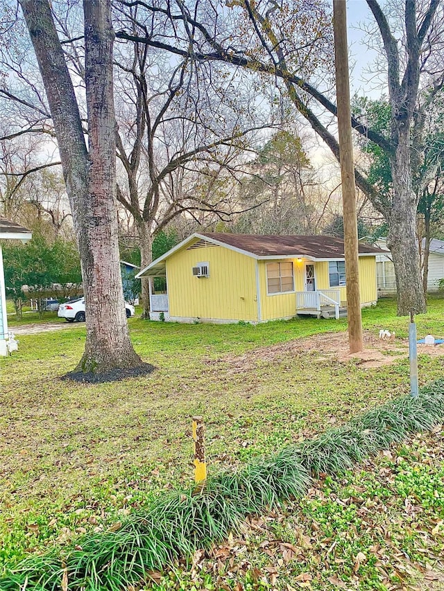 exterior space with a front yard