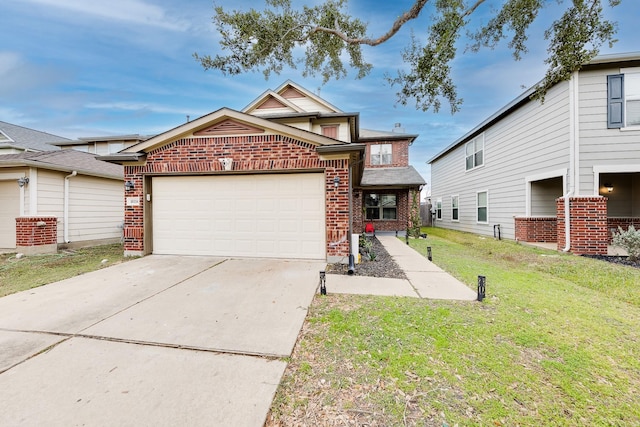 view of front of property featuring a garage and a front yard