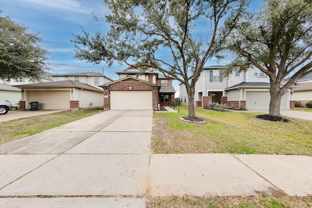 view of front of home featuring a garage and a front lawn