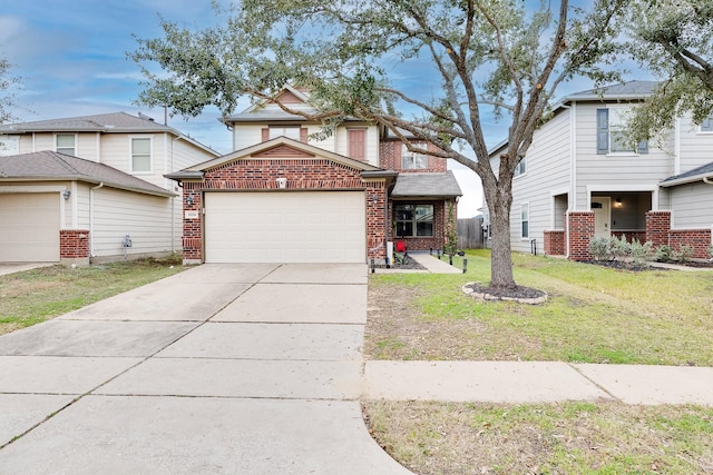 view of front of property with a garage and a front lawn