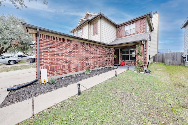 view of front facade with a front yard