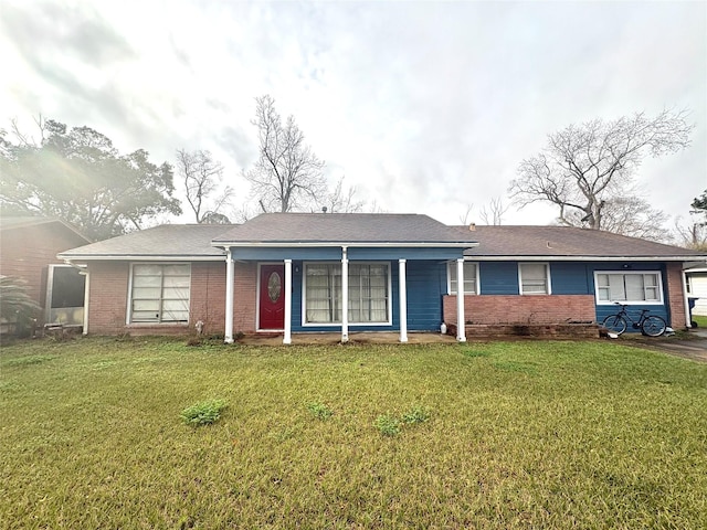 ranch-style home with a front yard