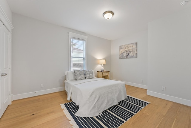 bedroom featuring wood-type flooring