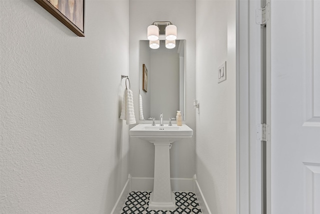 11 Caravelle Ct, Galveston, TX 77554 - bathroom with baseboards