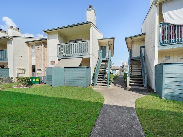 exterior space with a front lawn