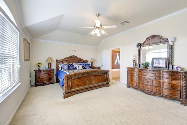 bedroom featuring vaulted ceiling, light colored carpet, visible vents, and crown molding