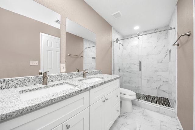 5879 Belcrest St, Houston, TX 77033 - bathroom with marble finish floors, a marble finish shower, double vanity, and recessed lighting