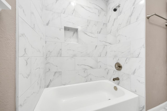 5879 Belcrest St, Houston, TX 77033 - bathroom featuring tub / shower combination