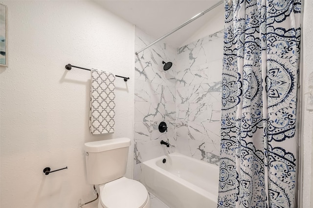 bathroom featuring shower / bathtub combination with curtain and toilet