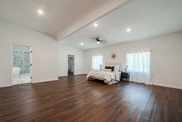 unfurnished bedroom with multiple windows, dark wood-type flooring, ceiling fan, and ensuite bath