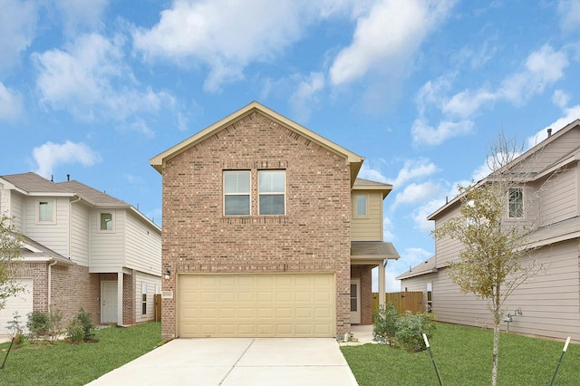 front of property featuring a garage and a front yard