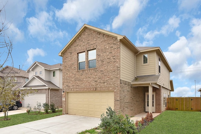 view of property with a garage and a front yard