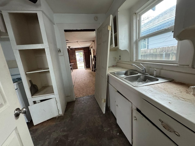 kitchen with sink and white cabinets