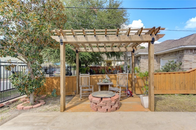 view of patio / terrace featuring an outdoor fire pit and a pergola