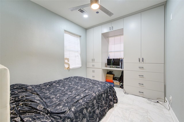 bedroom featuring ceiling fan