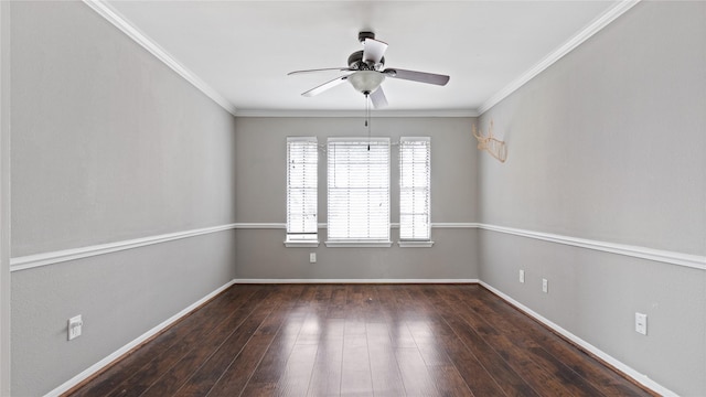 spare room with crown molding, ceiling fan, and dark hardwood / wood-style flooring