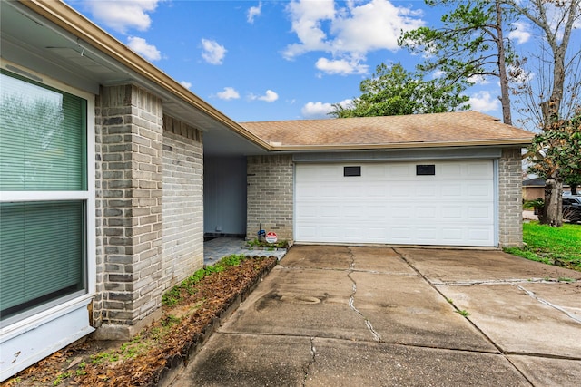 exterior space with a garage