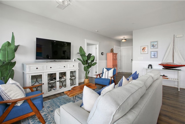 living room featuring dark hardwood / wood-style flooring