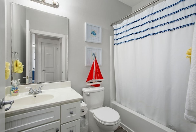 full bathroom featuring shower / bath combination with curtain, vanity, and toilet