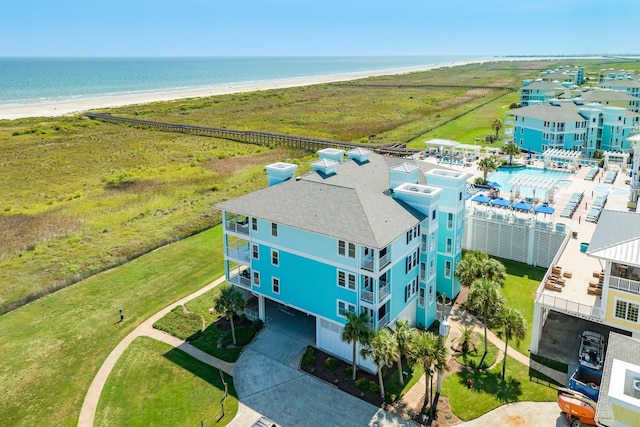 bird's eye view with a view of the beach and a water view