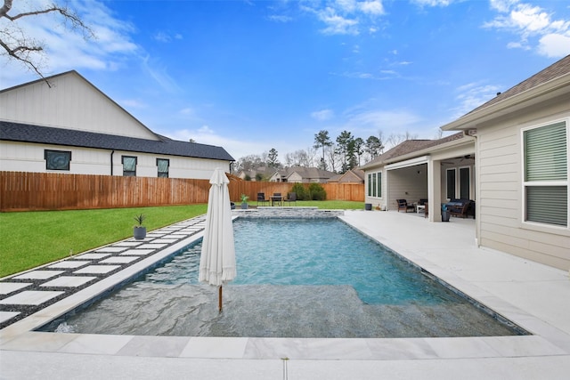 view of pool featuring a yard, ceiling fan, and a patio area