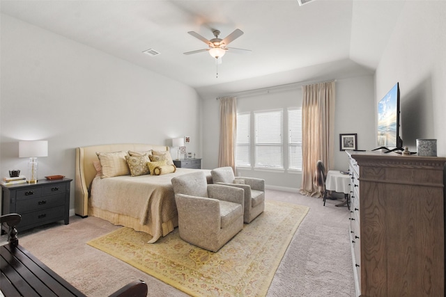 carpeted bedroom featuring vaulted ceiling and ceiling fan