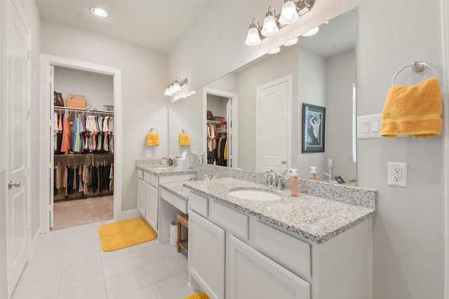 bathroom featuring vanity and tile patterned flooring