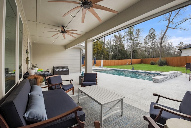 view of patio / terrace with outdoor lounge area and a fenced in pool