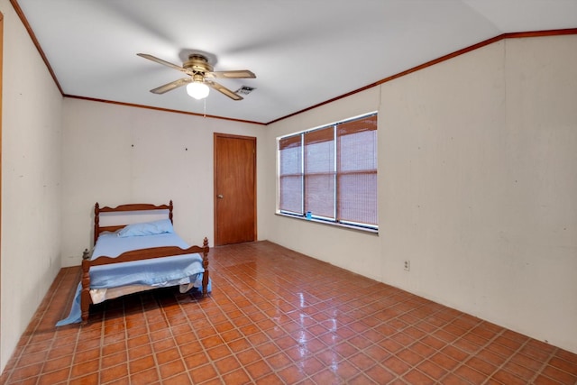 tiled bedroom with ceiling fan, ornamental molding, and a closet