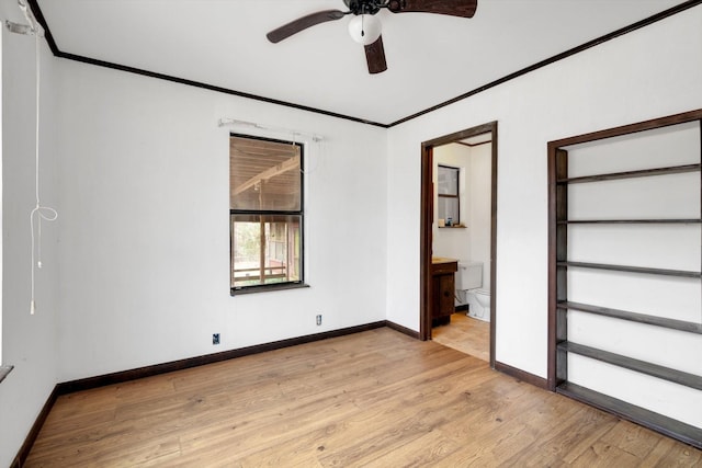 unfurnished bedroom featuring crown molding, light hardwood / wood-style flooring, ensuite bath, and ceiling fan