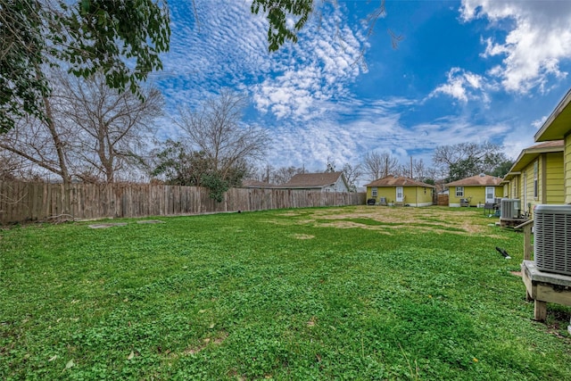 view of yard featuring central AC unit