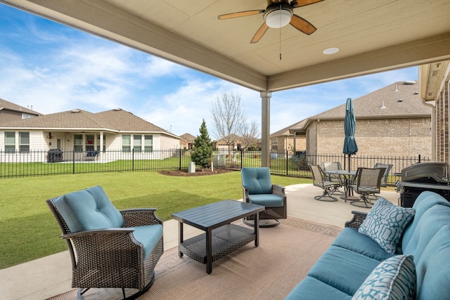 view of patio / terrace with grilling area, outdoor lounge area, and ceiling fan