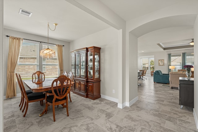 dining area with ceiling fan