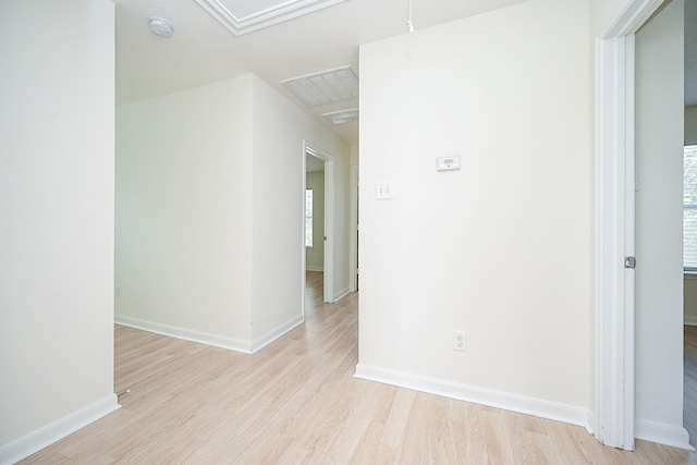 hall with light wood-type flooring