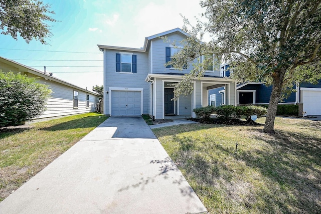 view of front property with a garage and a front yard