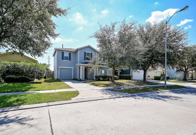 front of property with a garage and a front yard