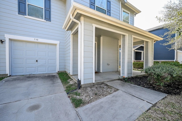 property entrance featuring a garage