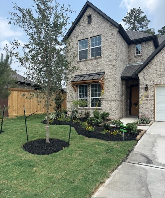 16147 Rustling Woods Rd, Conroe, TX 77302 - view of front of house with brick siding and concrete driveway