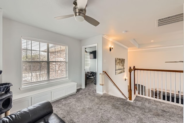 living area with ceiling fan and light colored carpet