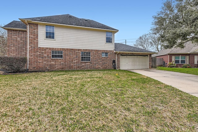 view of side of property featuring a garage and a yard