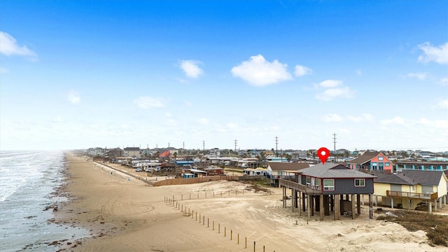 property view of water featuring a beach view